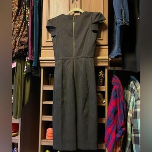 Calvin Klein office dress. Very flattering and elegant.Never used it